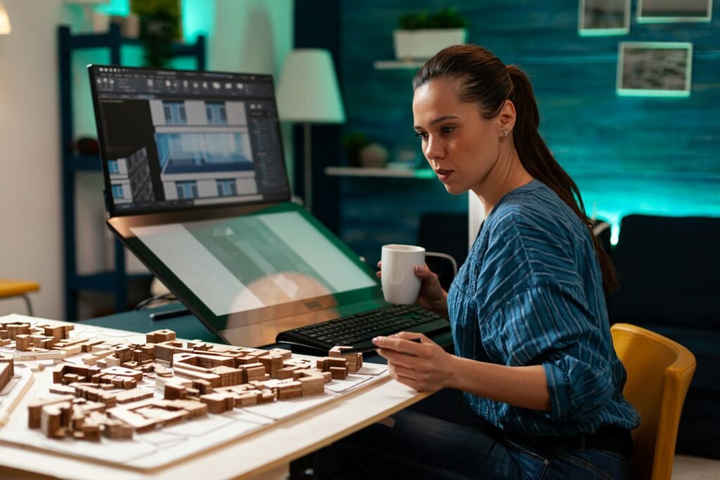 Woman with architect occupation working on blueprint